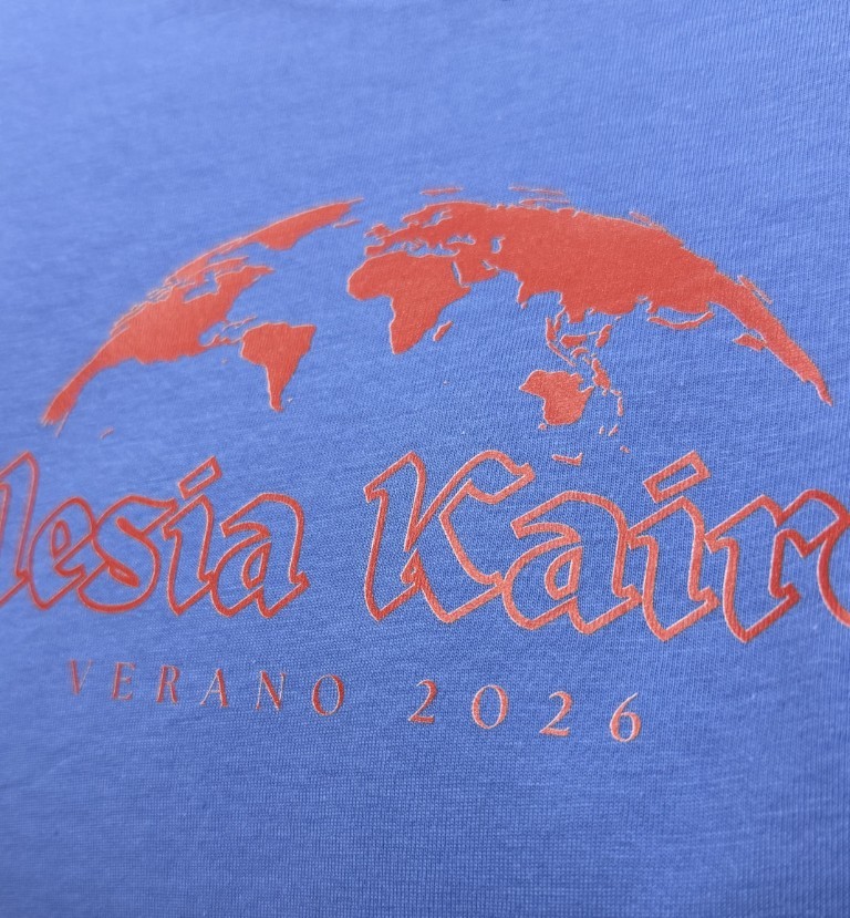 Close-up of a full-color DTF print on a blue t-shirt produced at the Naples shop